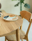 Table de salle à manger ronde à rallonge en bois de chêne MALMO | VESKOR